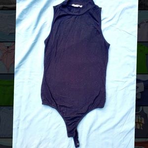 Black bodysuit (not dark blue)